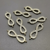 Коннектор Бесконечность с фианитами, 26*7.5 мм, позолота