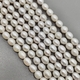 Жемчуг натуральный рисовый, белый, 10*9 мм, нитка