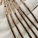 Бусина Гематит, трубочка, 9*3 мм, коричневый, нитка